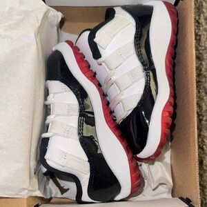 Jordan Kids Black, White, and Red Sneakers